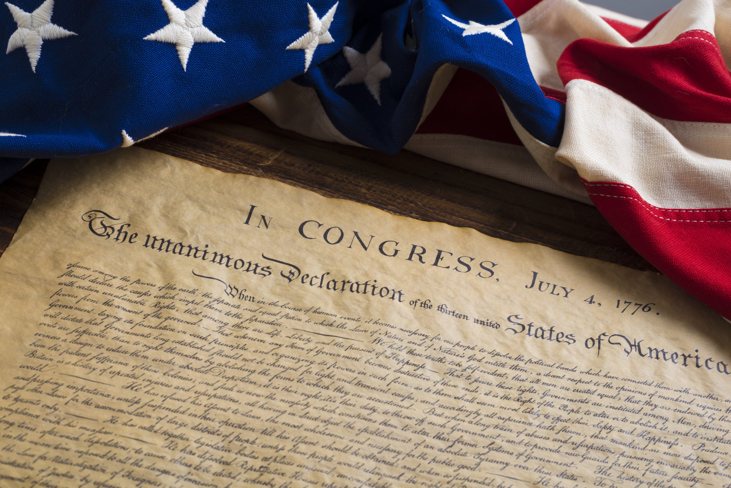 United States Declaration of Independence with vintage flag of the United States.